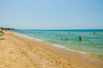 Amazing beauty white sand beach of Greece. Turquoise sea water and blue sky. Beautiful background.