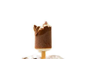 Close up view of bitten off ice cream in chocolate glaze on white background.