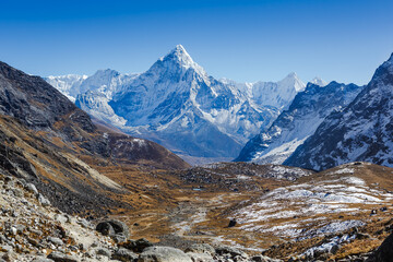 Fototapeta na wymiar beautiful view of mount Ama Dablam and Khumbu valley with beautiful sky on the way to Everest base camp, Sagarmatha national park, Everest area, Nepal