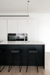 Modern light kitchen with counter and cupboard