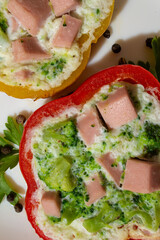 Food photo of breakfast protein omelet in rings with pepper with broccoli and ham filling
