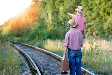 father and son cowboys concept happiness