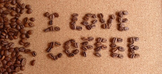 I love coffee wallpaper, roasted coffee beans on cork, warm brown background