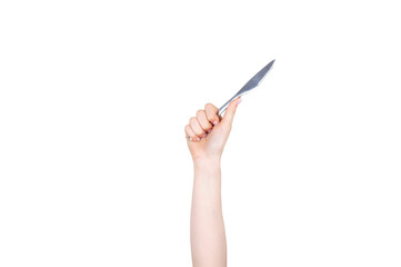 Hand holding silver knife on white background isolated. Food and restaurant items. Concept of hands and body parts.