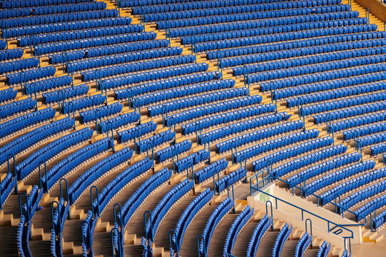 Blue Empty Seats At The Stadium.