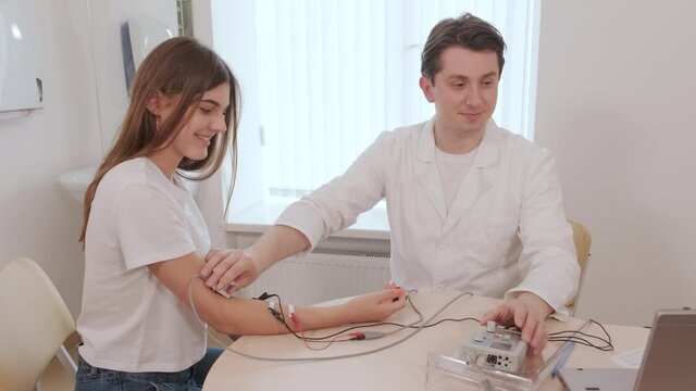 Patient nerves testing using electromyography at medical center