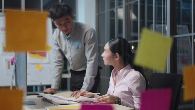 Asia group MBA college people or success man and woman talk in staff room work late in project digital reskill upskill job career workshop. Data analyst finance advice plan idea in sale report paper.