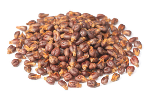 small heap of dried grape seeds isolated on white background
