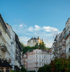 Fototapeta na wymiar Summer view of Karlovy vary alley