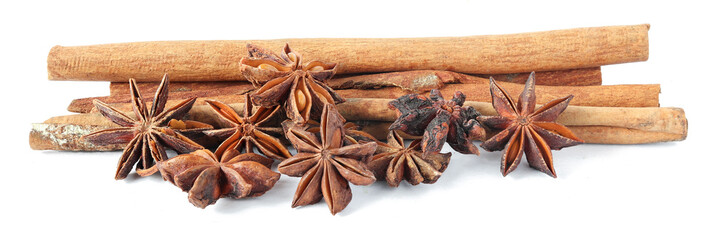 Cinnamon sticks and anise star isolated on white background