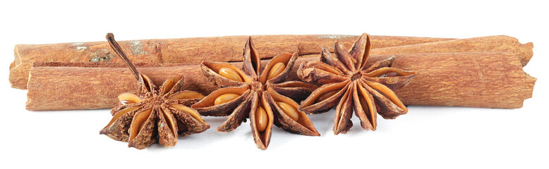 Cinnamon sticks and anise star isolated on white background