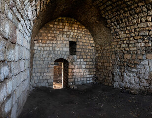 Fototapeta premium The inner hall of the ruins of crusader Fortress Chateau Neuf - Metsudat Hunin is located at the entrance to the Israeli Margaliot village in the Upper Galilee in northern Israel