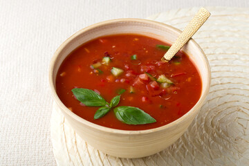 Gazpacho in bowl on table with spoon