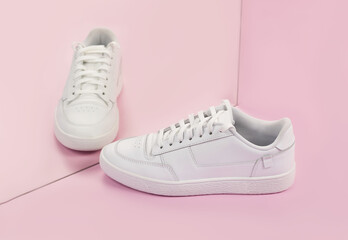 Sports sneakers on a pink background
