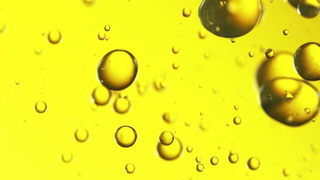Super slow motion of flowing oil bubbles in water. Filmed on high speed cinema camera, 1000fps.