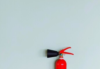 fire extinguisher on a wall