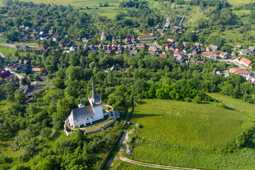 Aerial drone view of Valeni reformed church, Transylvania, Romania