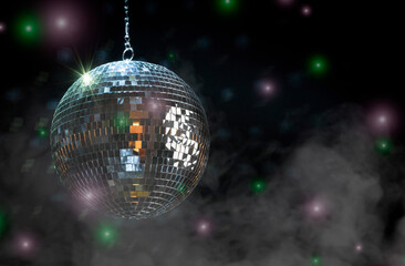 Vibrant image of a glittering disco ball and dazzling lights, creating a festive ambiance.