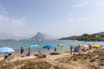 Cala Girgolu beach with Tavolara Island in background, Sardinia, Italy, Europe