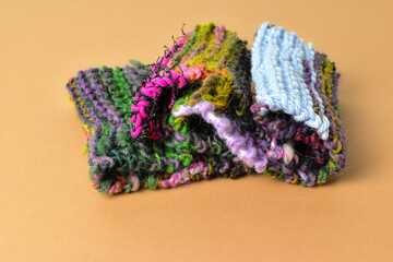 colourful hand knitting hand knit fabric in textured stitch and bright colours 