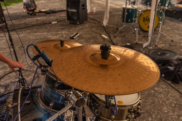 Fototapeta na wymiar Drums on stage in Chrudim town on punk festival with cymbals and stands