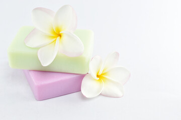 natural soap and plumeria on white background.