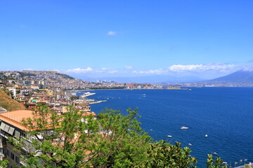 Fototapeta na wymiar Panoramic view of Naples city, Mount Vesuvius and gulf of Napoli, Mediterranean sea, Italy