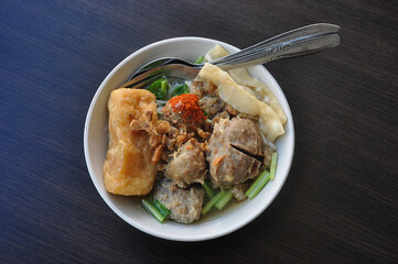 Indonesian food, meatballs with a mixture of tofu, crackers, and vegetables