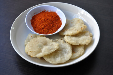 cireng with chili powder seasoning.
Cireng is a traditional Indonesian food made from tapioca flour, seasoned with spices such as garlic, salt, pepper and cooked by frying