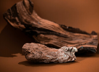stone and wood on brown background