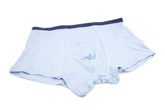 Light blue underpants and clothing isolated on white background.