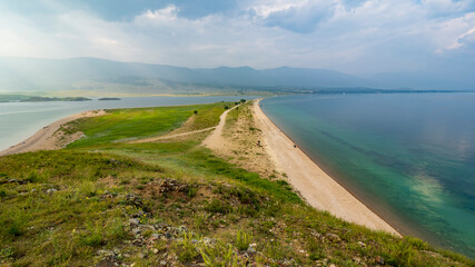 View from Cape Uyugа to the mountains and Lake Baikal, small sea