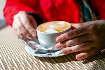 A simple image of a morning cup of coffee with cream. Good morning!