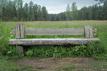 old rough wooden country bench, front view, concept of privacy, silence, tranquility, pacification,  inherit parental home