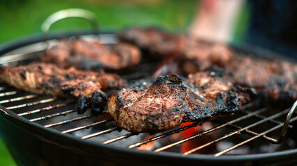 Frying meat on the grill