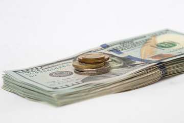 A stack of hundred-dollar bills on a white isolated background. 100 dollar bills