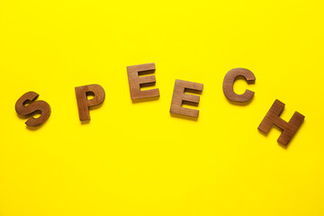 Word SPEECH on color background