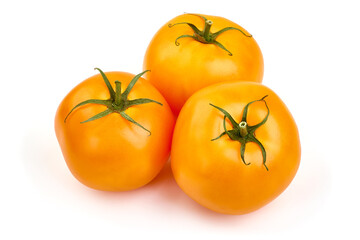 Fresh yellow tomatoes, isolated on white background.
