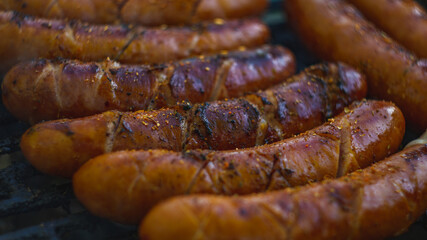Tasty grilled sausages on holiday