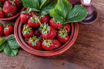 Fresh strawberries on a wooden table