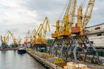 Fototapeta na wymiar Metal pipes ready for shipment in sea port in Ukraine