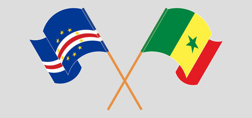 Crossed and waving flags of Cape Verde and Senegal