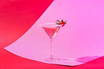 Glass of tasty cosmopolitan cocktail on color background - obrazy, fototapety, plakaty