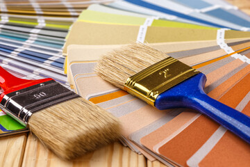 Close-up on color palette guide for printing and painting. Concept - choice of colors for design.