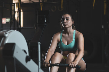 Fototapeta na wymiar a Colombian girl doing sports in a gym.