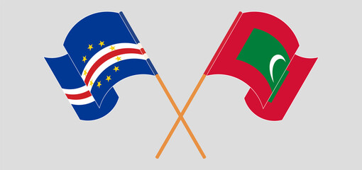 Crossed and waving flags of Cape Verde and Maldives