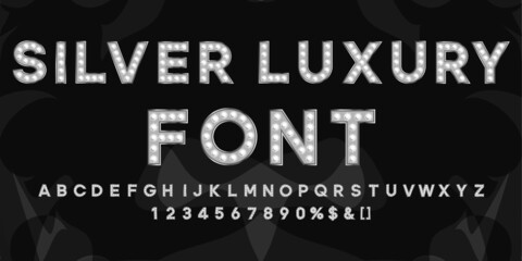 Silver marquee letters with light. Club signboard text with illuminated effect. © Mariia
