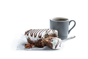 decorated sponge cake on serving board with coffee mug isolated on white