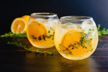 Meyer Lemon and Thyme Bees Knees Cocktails: Gin cocktails made with Meyer lemon juice and garnished...