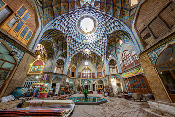 Old bazaar in Kashan, Iran. The bazaar was built in the 13th century and restored in the 19th century by the Safavids. - obrazy, fototapety, plakaty